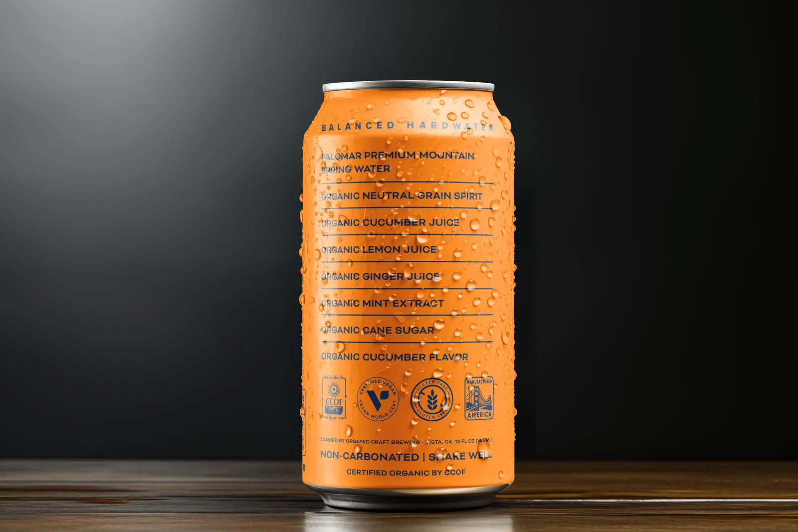 The back of a SUNGOD can showing the ingredient panel: Palomar spring water, organic neutral grain spirit, organic juices, organic cane sugar